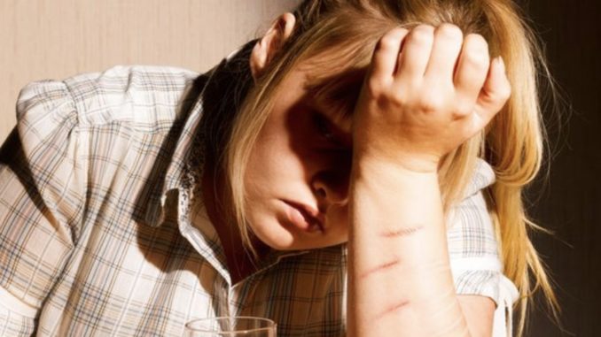 feature image of teenager self-harm