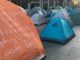 A protest sign at the Martin Place homeless camp from 2017 which says, "For many this is what affordable Sydney housing looks like".