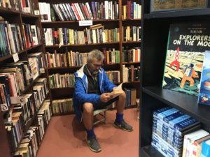 Man reading at Sappho books