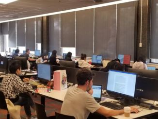 A large number of international students can be found studying hard in the university library.