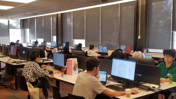 A large number of international students can be found studying hard in the university library.