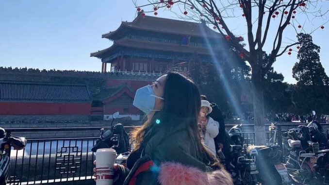 Crystal wearing a facemask in Beijing