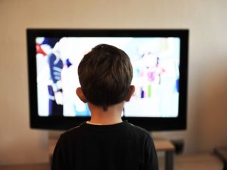 Kid watching tv