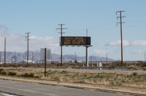 Travel restriction display on highway