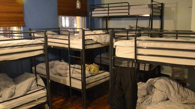This image shows the overcrowding and poor living condition for international students