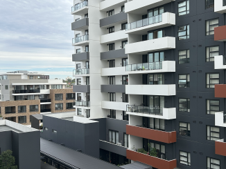 Modern apartment buildings in Sydney with balconies and mixed exterior finishes. Photo by Kate Huang.