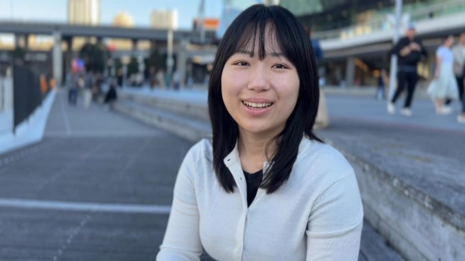 Nan Su's portrait Nan Su gives an interview outside the Australian National Maritime Museum in Darling Harbour, Sydney. (Image Credit: Yi Yang)